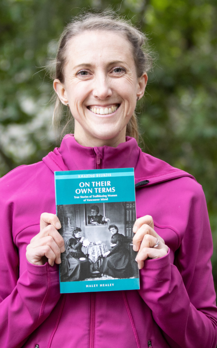 Alum of the Month Hayley Healey holds her published book